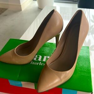 Beige leather pumps